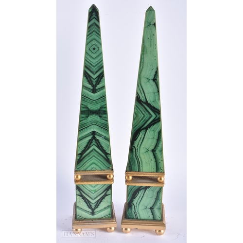 10 - A PAIR OF IMITATION MALACHITE COUNTRY HOUSE OBELISKS. 36 cm high.