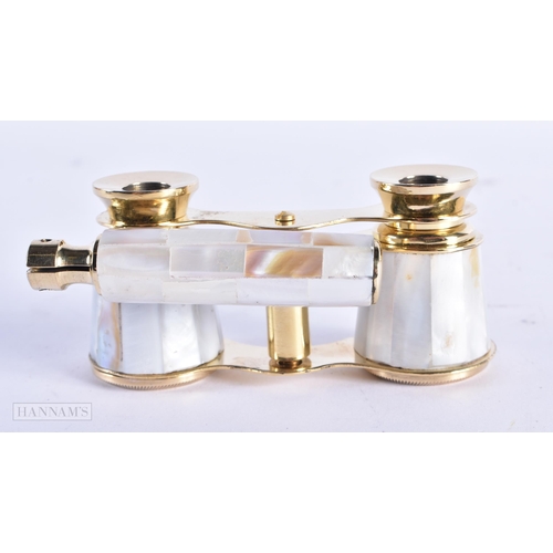 128 - A PAIR OF MOTHER OF PEARL OPERA GLASSES. 18cm x 8 cm extended.