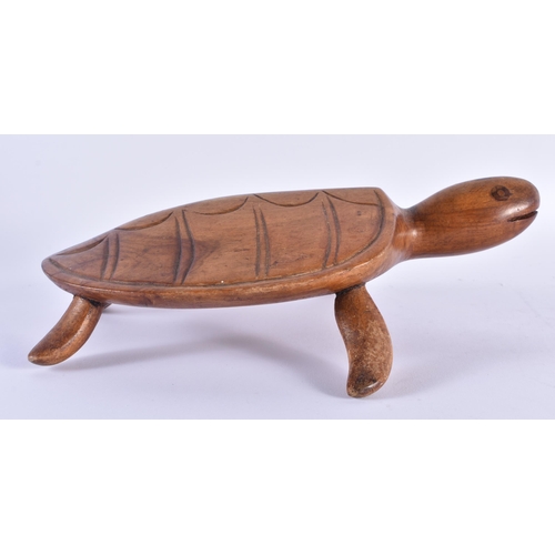 136 - AN UNUSUAL PITCAIRN ISLANDS TORTOISE by Christy Warren. 25 cm wide.