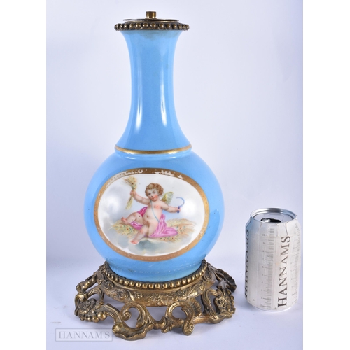 156 - A LARGE 19TH CENTURY FRENCH PARIS PORCELAIN LAMP painted with putti. 34 cm high.