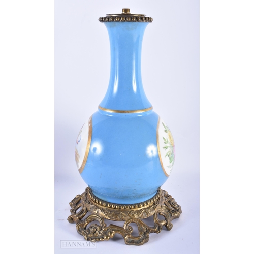 156 - A LARGE 19TH CENTURY FRENCH PARIS PORCELAIN LAMP painted with putti. 34 cm high.