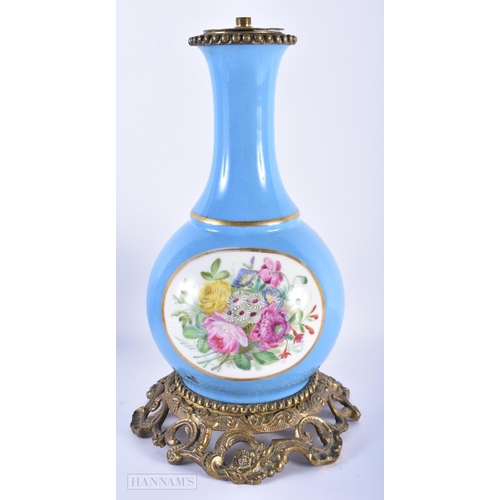 156 - A LARGE 19TH CENTURY FRENCH PARIS PORCELAIN LAMP painted with putti. 34 cm high.