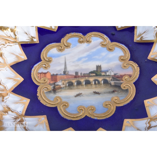 161 - AN EARLY 19TH CENTURY CHAMBERLAINS PORCELAIN BASKET painted with a view of Worcester. 21 cm wide.