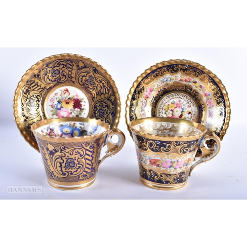 162 - A PAIR OF EARLY 19TH CENTURY CHAMBERLAINS WORCESTER CUPS AND SAUCERS painted with flowers. 15cm wide... 