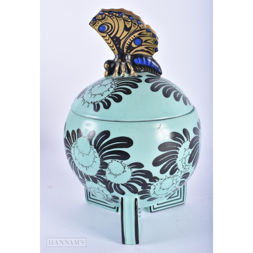 165 - A LOVELY ART DECO GERMAN CERAMIC PRESERVE JAR AND COVER painted with flowers, surmounted with a gild... 