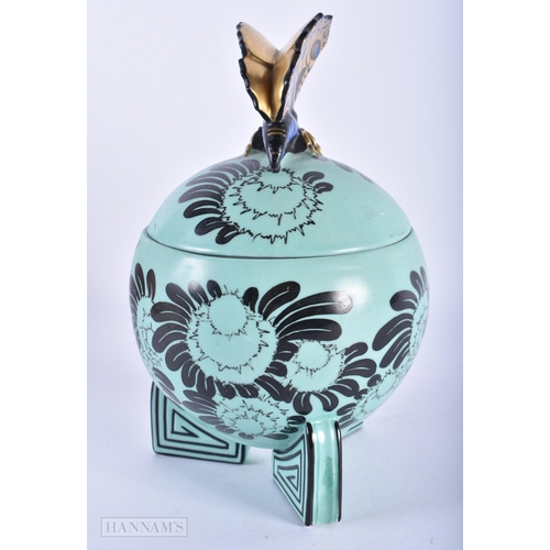 165 - A LOVELY ART DECO GERMAN CERAMIC PRESERVE JAR AND COVER painted with flowers, surmounted with a gild... 