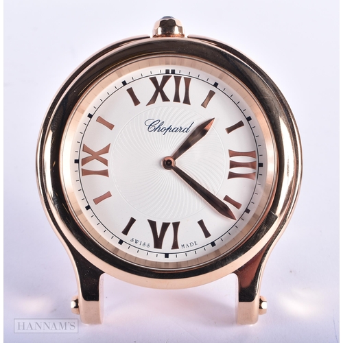 171 - A LOVELY CHOPARD BOXED TABLE CLOCK within a rose metal surround. 10 cm wide. Running