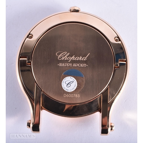 171 - A LOVELY CHOPARD BOXED TABLE CLOCK within a rose metal surround. 10 cm wide. Running