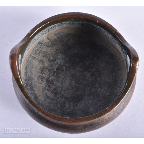 172 - A CHINESE TWIN HANDLED BRONZE CENSER. 311 grams. 8 cm wide.