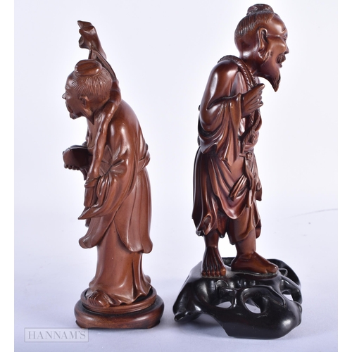 186 - TWO 19TH CENTURY CHINESE CARVED HARDWOOD FIGURES Qing. 17 cm high. (2)