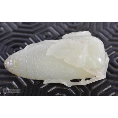 194 - A 19TH CENTURY CHINESE CARVED WHITE JADE SNUFF BOTTLE Qing, formed as a fruiting pod. 5 cm x 2.5 cm.