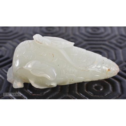 194 - A 19TH CENTURY CHINESE CARVED WHITE JADE SNUFF BOTTLE Qing, formed as a fruiting pod. 5 cm x 2.5 cm.