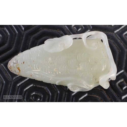 194 - A 19TH CENTURY CHINESE CARVED WHITE JADE SNUFF BOTTLE Qing, formed as a fruiting pod. 5 cm x 2.5 cm.