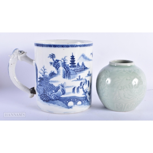 196 - AN 18TH CENTURY CHINESE EXPORT BLUE AND WHITE TANKARD Qianlong, together with a celadon jar. Largest... 