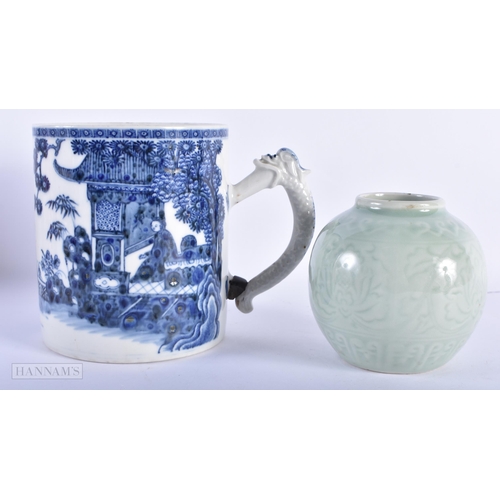 196 - AN 18TH CENTURY CHINESE EXPORT BLUE AND WHITE TANKARD Qianlong, together with a celadon jar. Largest... 