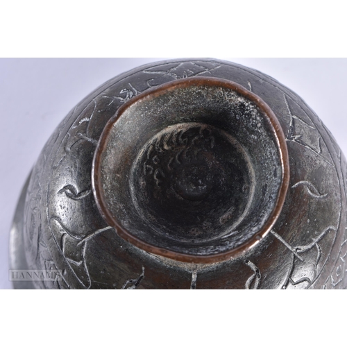 20 - A 17TH/18TH CENTURY MIDDLE EASTERN ISLAMIC BRONZE ALLOY BOWL decorated with scripture. 11cm diameter... 