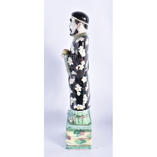 205 - A LARGE 19TH CENTURY CHINESE FAMILLE NOIRE PORCELAIN FIGURE OF AN IMMORTAL together with a cloisonne... 