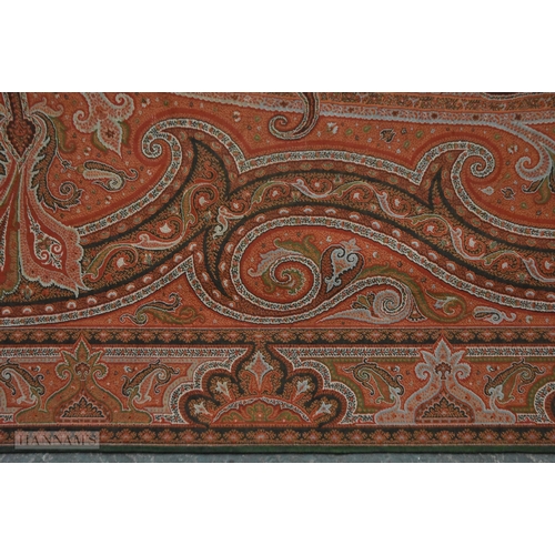 21 - A VERY LARGE PAISLEY EMBROIDERED SHAWL HANGING OR BED SPREAD. 340 cm x 180 cm approximately.