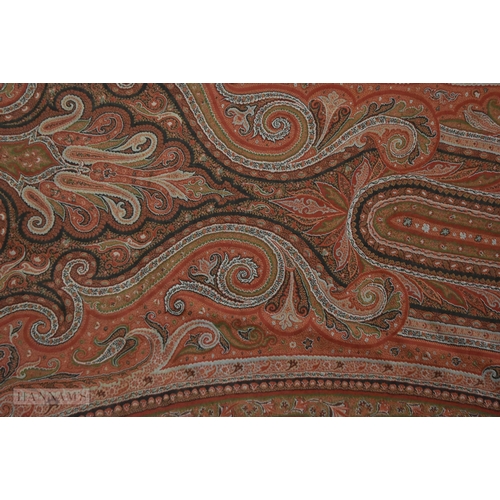 21 - A VERY LARGE PAISLEY EMBROIDERED SHAWL HANGING OR BED SPREAD. 340 cm x 180 cm approximately.