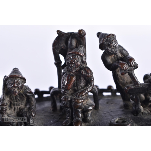 213 - A 19TH CENTURY JAPANESE MEIJI PERIOD BRONZE OKIMONO modelled with figures upon a boat. 13 cm wide.