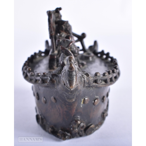 213 - A 19TH CENTURY JAPANESE MEIJI PERIOD BRONZE OKIMONO modelled with figures upon a boat. 13 cm wide.