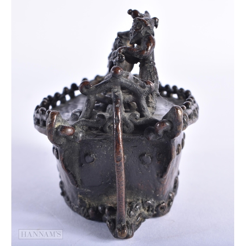 213 - A 19TH CENTURY JAPANESE MEIJI PERIOD BRONZE OKIMONO modelled with figures upon a boat. 13 cm wide.