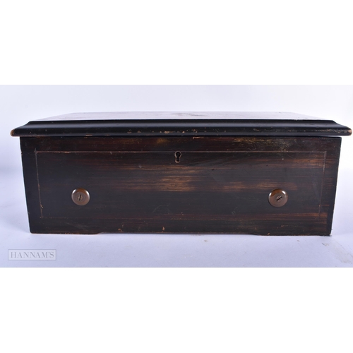 214 - A 19TH CENTURY SWISS MUSICAL BOX playing four airs. 31 cm x 15cm, barrel 14.5 cm wide.