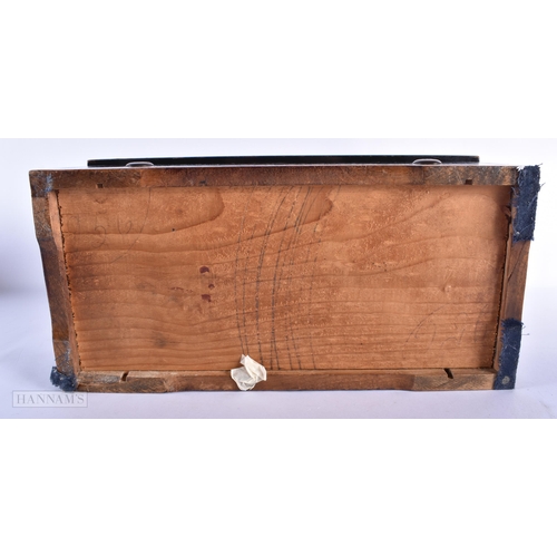 214 - A 19TH CENTURY SWISS MUSICAL BOX playing four airs. 31 cm x 15cm, barrel 14.5 cm wide.