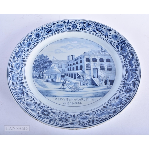 218 - A LARGE SET OF THREE DUTCH DELFT BLUE AND WHITE DISHES painted with boats and landscapes. 32 cm diam... 