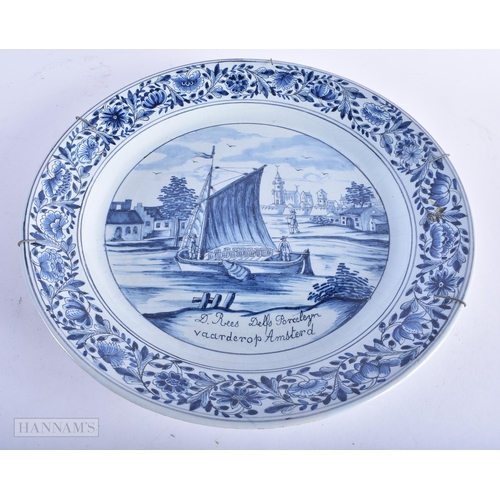 218 - A LARGE SET OF THREE DUTCH DELFT BLUE AND WHITE DISHES painted with boats and landscapes. 32 cm diam... 