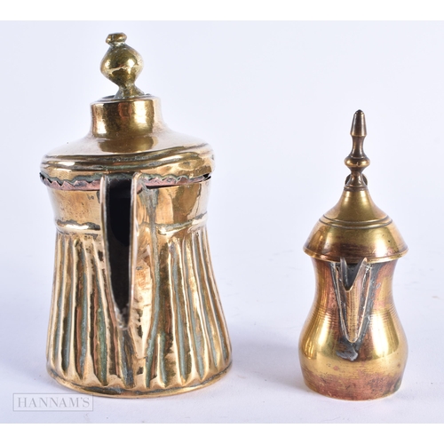 22 - TWO 19TH CENTURY PERSIAN ISLAMIC MIDDLE EASTERN EWERS. Largest 12 cm x 12 cm. (2)