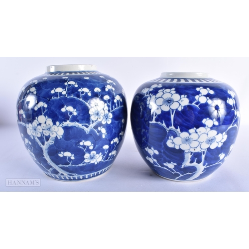 220 - TWO 19TH CENTURY CHINESE BLUE AND WHITE PORCELAIN GINGER JARS bearing Kangxi marks to base. Largest ... 