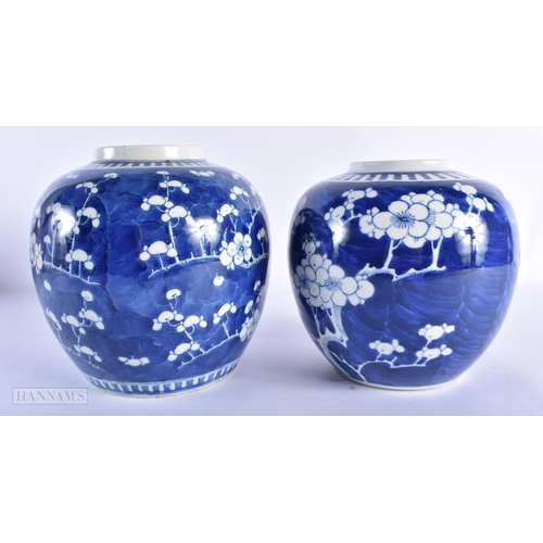 220 - TWO 19TH CENTURY CHINESE BLUE AND WHITE PORCELAIN GINGER JARS bearing Kangxi marks to base. Largest ... 