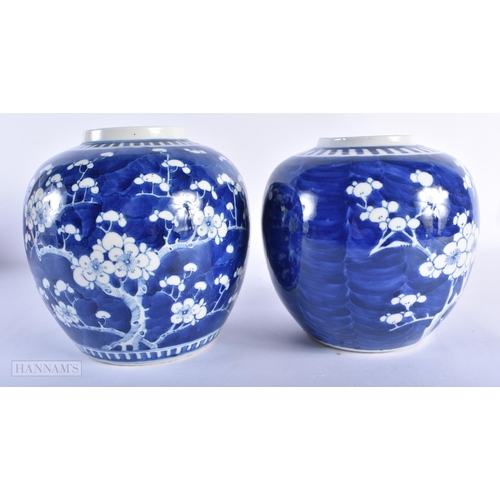 220 - TWO 19TH CENTURY CHINESE BLUE AND WHITE PORCELAIN GINGER JARS bearing Kangxi marks to base. Largest ... 