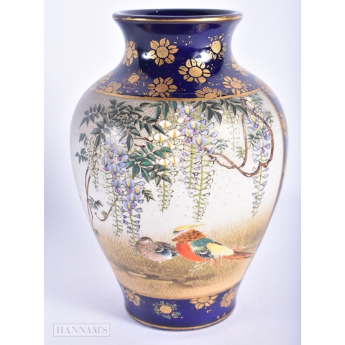 222 - A 19TH CENTURY JAPANESE MEIJI PERIOD SATSUMA VASE painted with birds in landscapes. 12 cm x 8 cm.