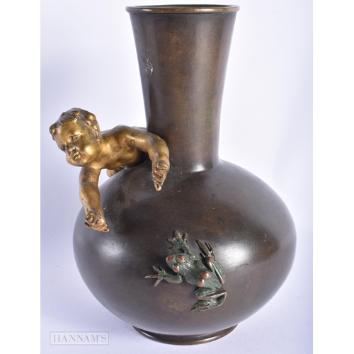 223 - A 19TH CENTURY FRENCH COLD PAINTED BRONZE VASE modelled with a nude boy chasing a frog. 18cm x 8 cm.