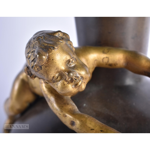 223 - A 19TH CENTURY FRENCH COLD PAINTED BRONZE VASE modelled with a nude boy chasing a frog. 18cm x 8 cm.