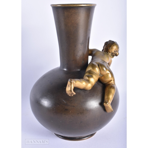 223 - A 19TH CENTURY FRENCH COLD PAINTED BRONZE VASE modelled with a nude boy chasing a frog. 18cm x 8 cm.