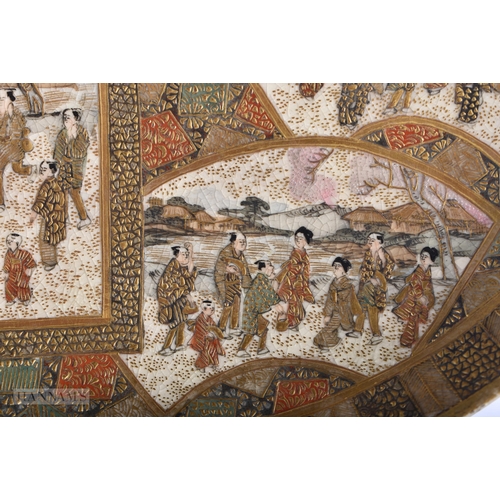 230 - A 19TH CENTURY JAPANESE MEIJI PERIOD SATSUMA DISH painted with figures within landscapes. 18cm diame... 