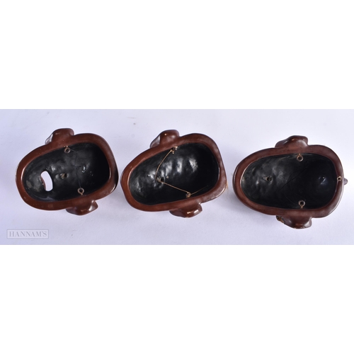 235 - THREE 19TH CENTURY JAPANESE MEIJI PERIOD LACQUERED MASKS. 12 cm x 8 cm. (3)