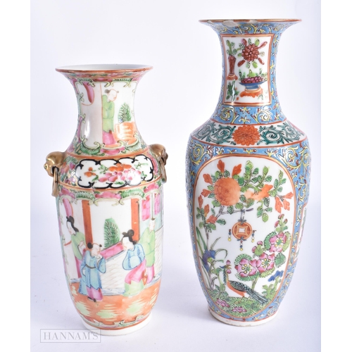 236 - TWO 19TH CENTURY CHINESE CANTON FAMILLE ROSE VASES. Largest 24 cm high. (2)