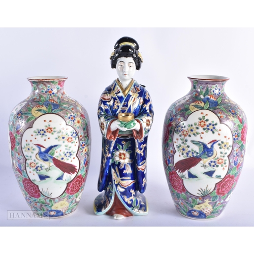 237 - A 19TH CENTURY JAPANESE MEIJI PERIOD AO KUTANI PORCELAIN FIGURE together with a pair of Japanese vas... 