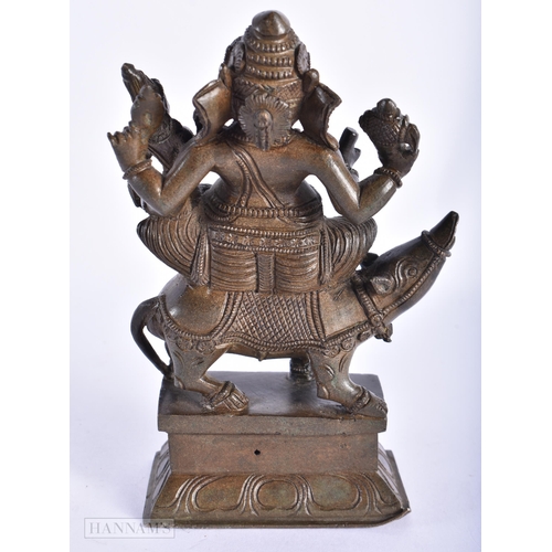 239 - A 19TH CENTURY INDIAN BRONZE FIGURE OF GANESHA modelled with attendants. 15cm high.