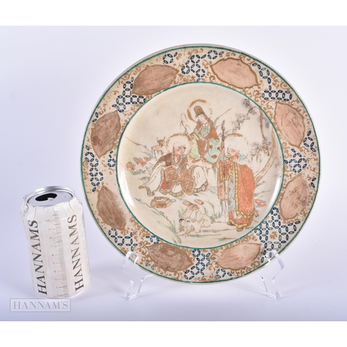 251 - A 19TH CENTURY JAPANESE MEIJI PERIOD SATSUMA PLATE painted with immortals. 24 cm diameter.