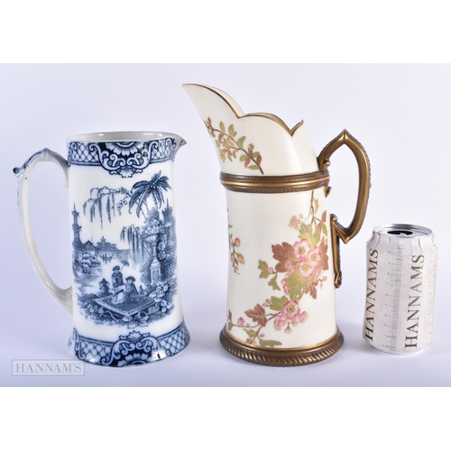 253 - A LARGE ROYAL WORCESTER BLUSH IVORY PORCELAIN JUG together with a Burslem blue and white jug. Larges... 