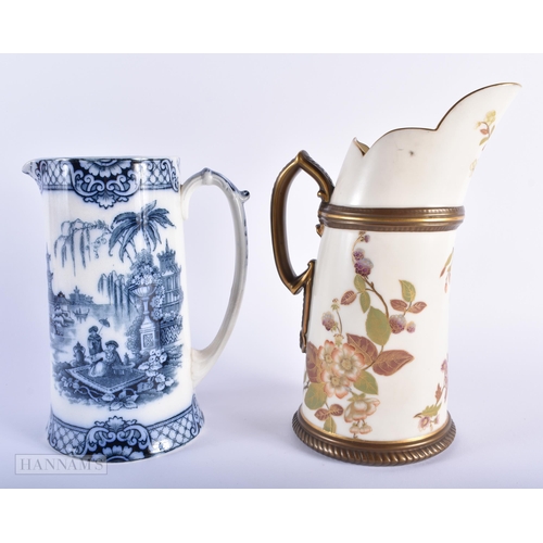 253 - A LARGE ROYAL WORCESTER BLUSH IVORY PORCELAIN JUG together with a Burslem blue and white jug. Larges... 