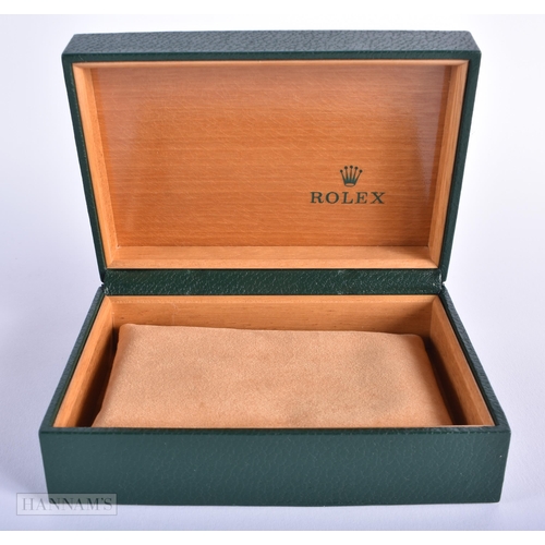 254 - A ROLEX WATCH BOX with papers. 15cm x 10 cm.