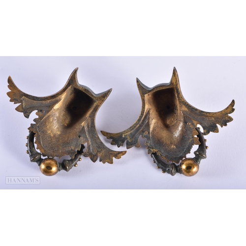 256 - A PAIR OF ART NOUVEAU BRONZE HANDLES together with a George III steel finial & weights. (qty)