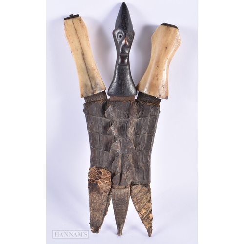 26 - AN ANTIQUE AFRICAN TRIBAL BONE AND CROCODILE SKIN KNIFE. 30 cm long.  We do not offer in-house shipp... 