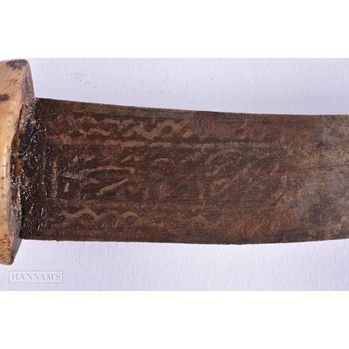 26 - AN ANTIQUE AFRICAN TRIBAL BONE AND CROCODILE SKIN KNIFE. 30 cm long.  We do not offer in-house shipp... 